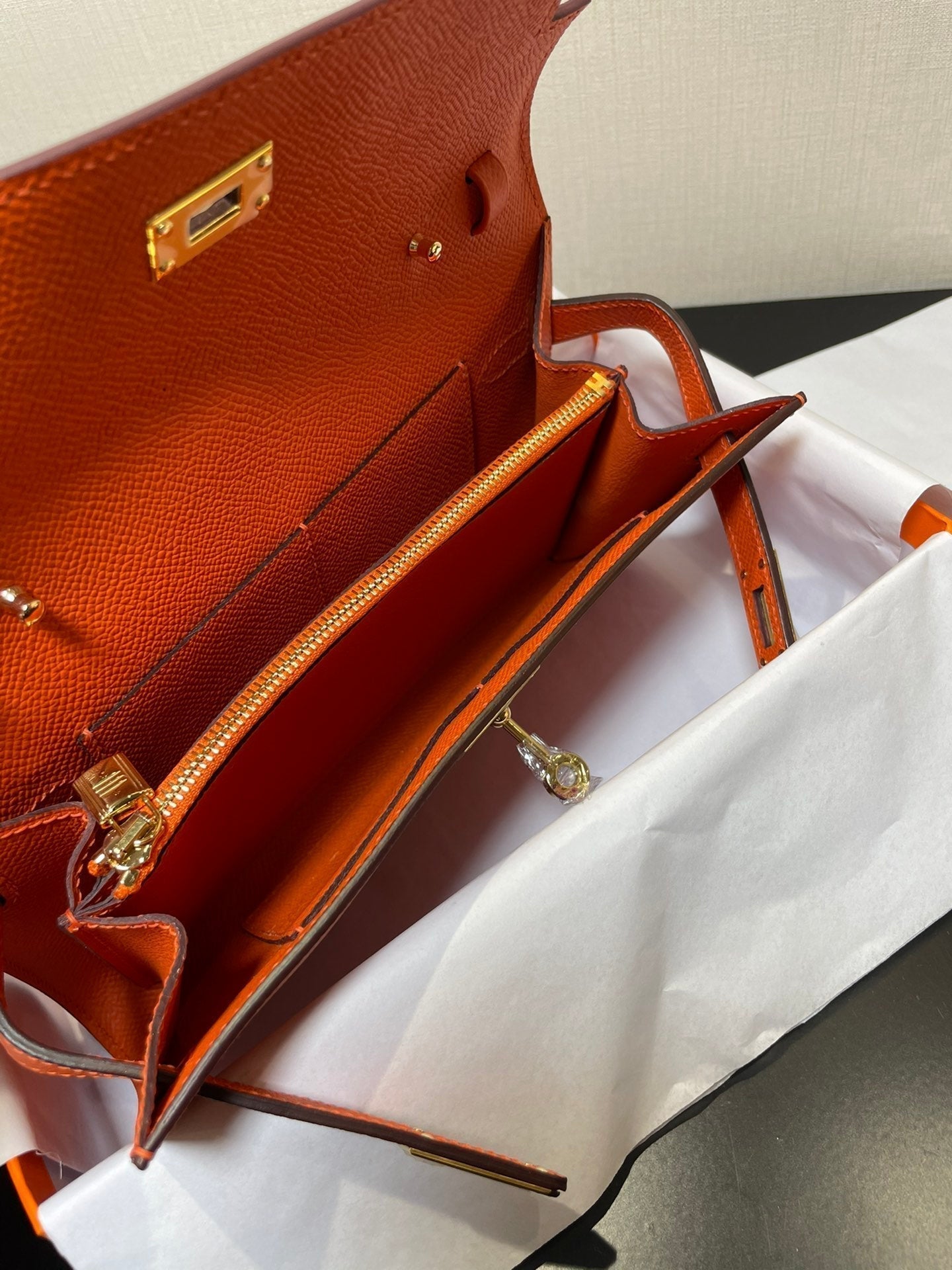 kelly to go wallet 20.5 orange epsom gold hardware