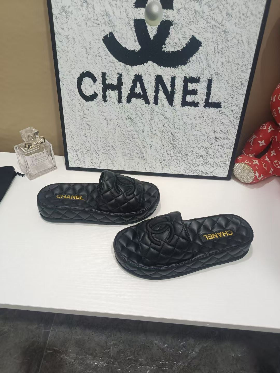 CC 26s Quilted Slide Sandals In Black Calfskin