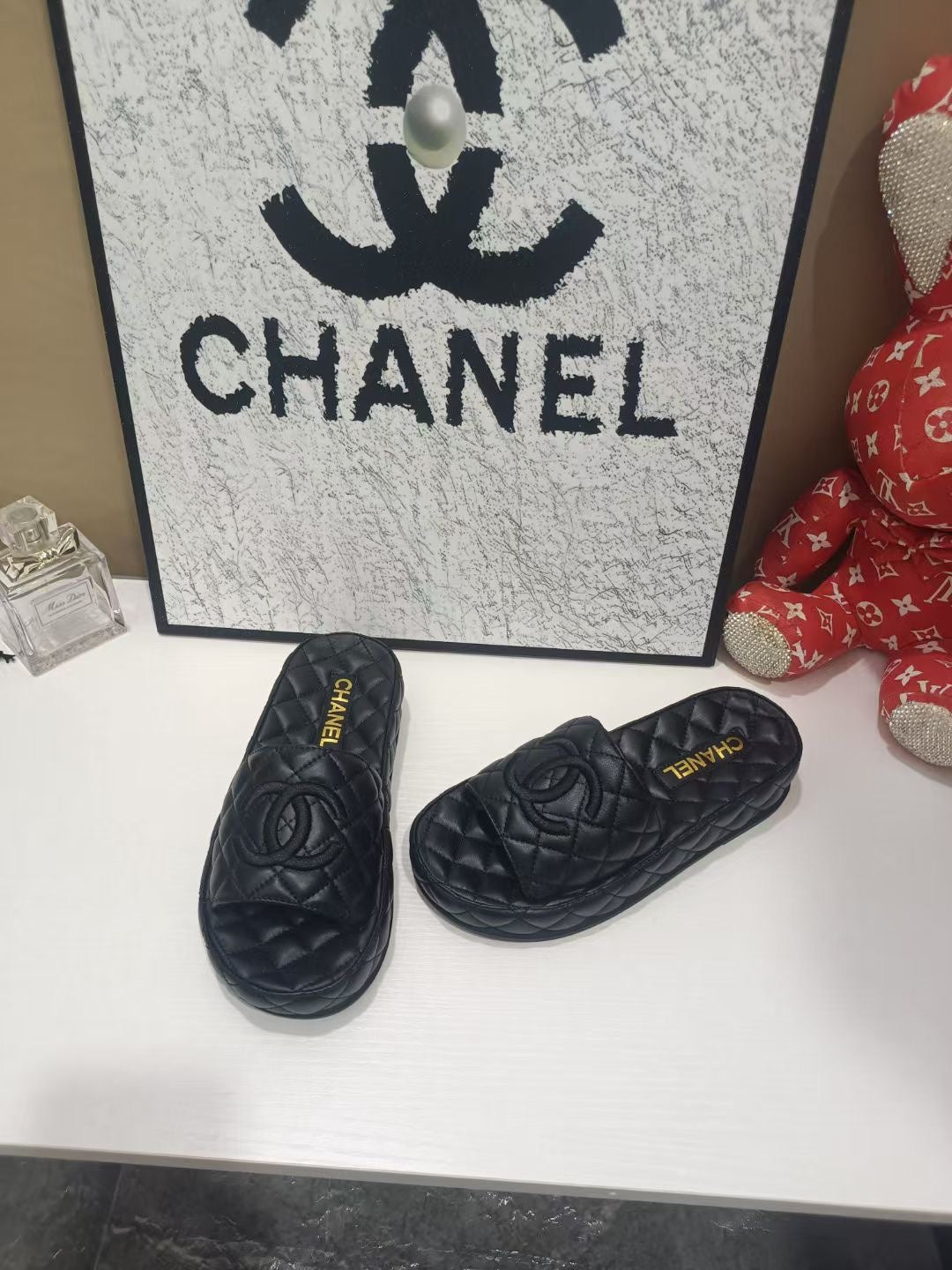 CC 26s Quilted Slide Sandals In Black Calfskin