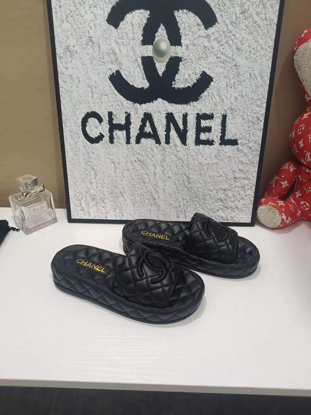 CC 26s Quilted Slide Sandals In Black Calfskin