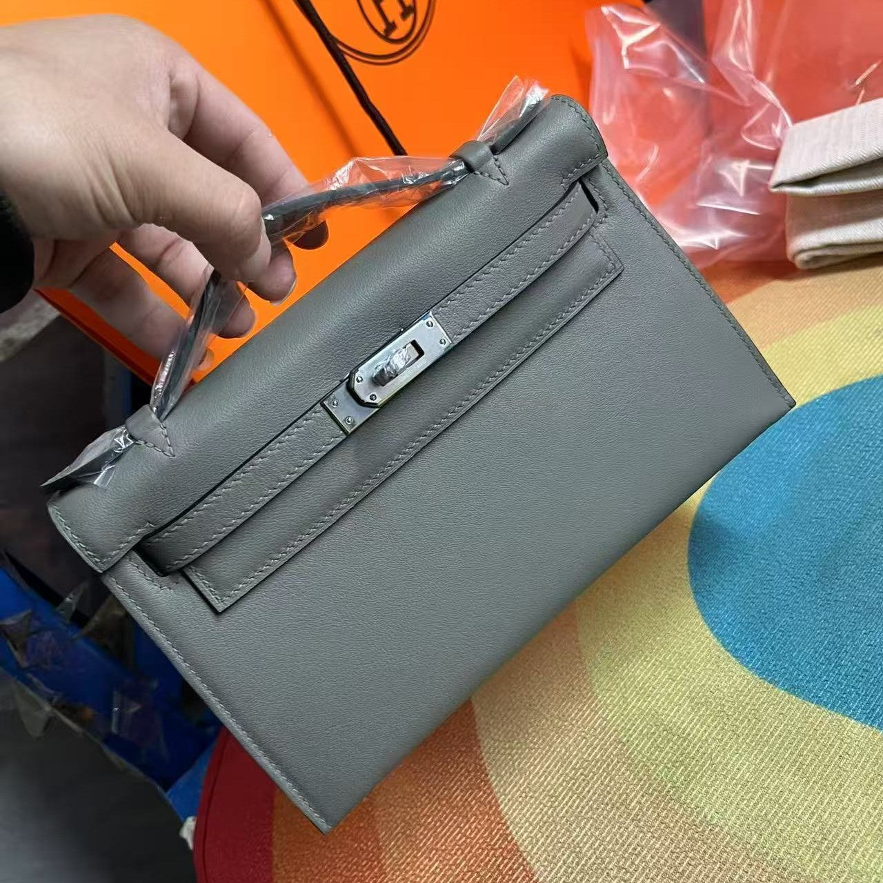 HM KELLY MINI POCHETTE 22 IN GREY CALFSKIN