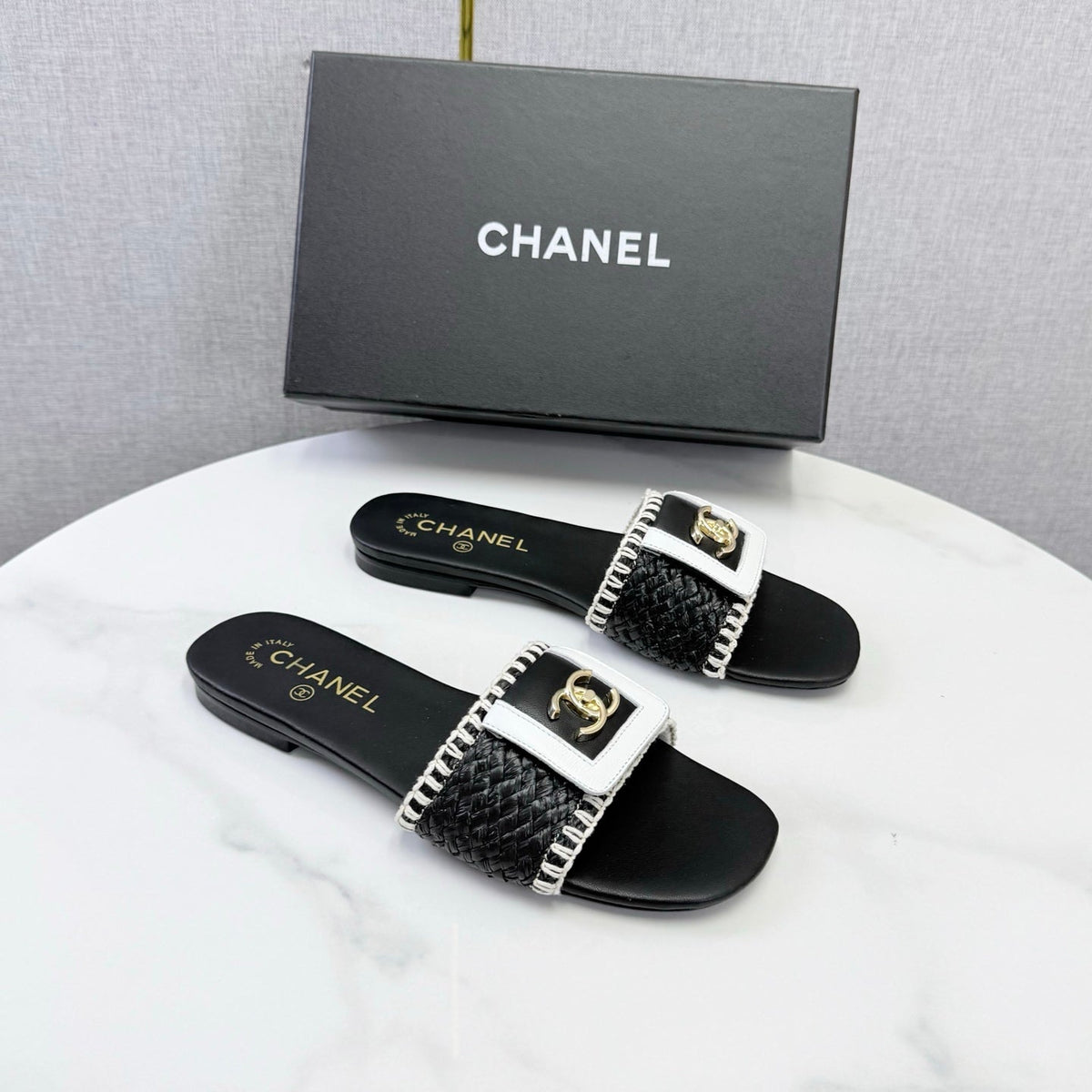 Chanel 26s Woven Strap Slides Black White Lambskin