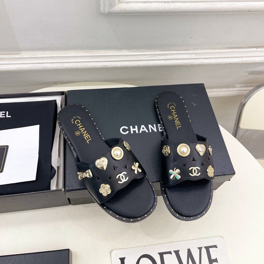 Chanel 26s Flat Sandals Black Lambskin Charm-Decorated